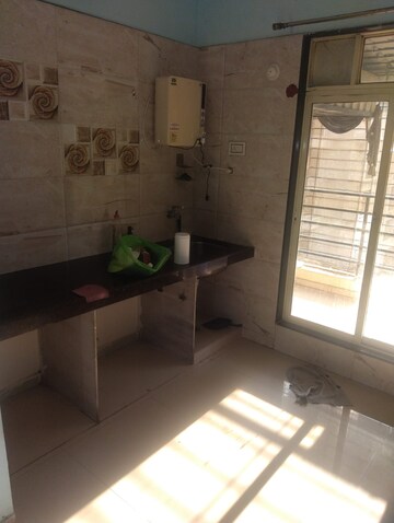 Kitchen in 2 BHK Apartment at Raj Chamunda Krishna Sagar, Taloja – for Rent