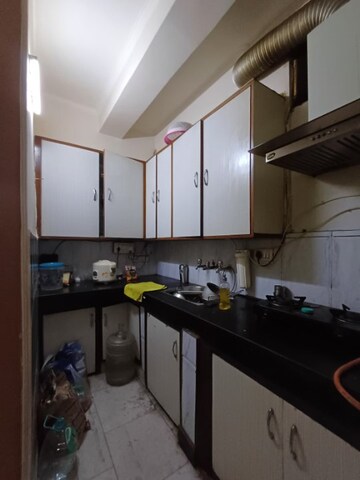 Kitchen in 2 BHK Builder Floor at Esteem Complex, Savitri Nagar – for Rent