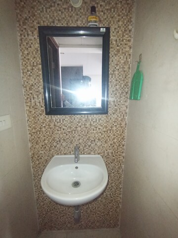 Bathroom in 1 BHK Apartment at Lodha Lakeshore Greens, Dombivli East – for Sale