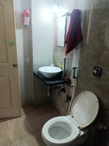 Bathroom in 1 BHK Apartment at Aashapura Crown City, Kalyan East – for Sale
