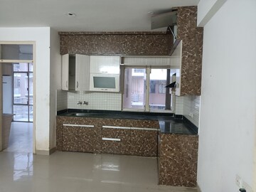 Kitchen in 2 BHK Apartment at Breez Global Heights, Sohna Sector 33 – for Rent