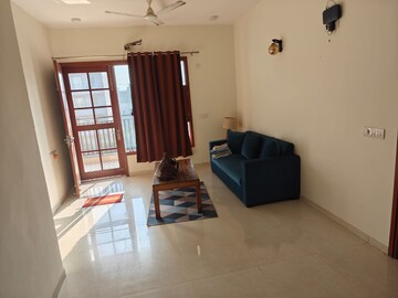 Living Room in 2 BHK Builder Floor at Ansal API Esencia, Sector 67 – for Rent