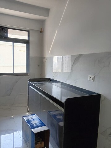 Kitchen in 2 BHK Apartment at Adarsh CHS Oshiwara, Oshiwara – for Rent