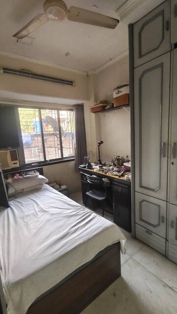 Bedroom in 2 BHK Apartment at Juhu Scheme, Juhu – for Rent