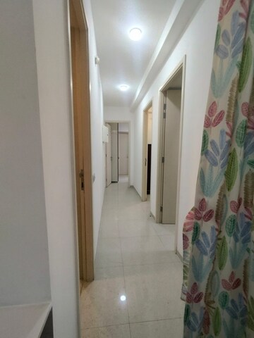 Building Lobby in 1.5 BHK Apartment at Hiranandani Fortune City, New Panvel – for Rent