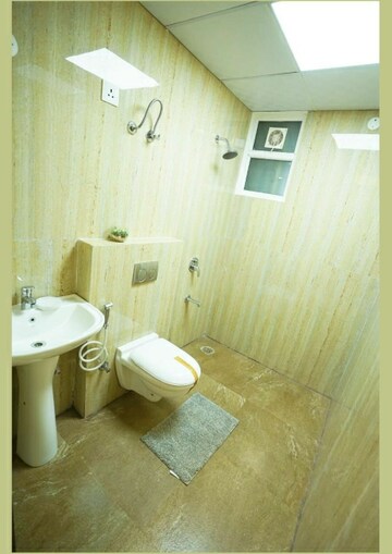 Bathroom in 3 BHK Apartment at Motia'z Harmony Greens, Dhakoli Village – for Sale