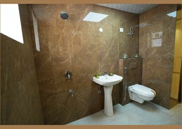 Bathroom in 3 BHK Apartment at Motia'z Harmony Greens, Dhakoli Village – for Sale
