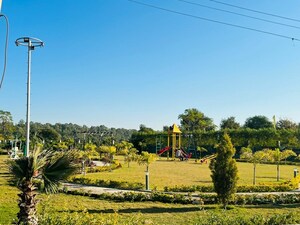 3 BHK Apartment – Garden View at Motia'z Harmony Greens, Dhakoli Village - for Sale