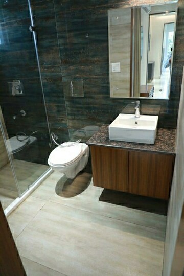 Bathroom in 3 BHK Apartment at Motia Blue Ridge, Dhakoli Village – for Sale