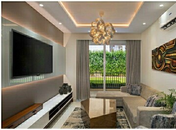 Living Room in 3 BHK Apartment at Motia Blue Ridge, Dhakoli Village – for Sale
