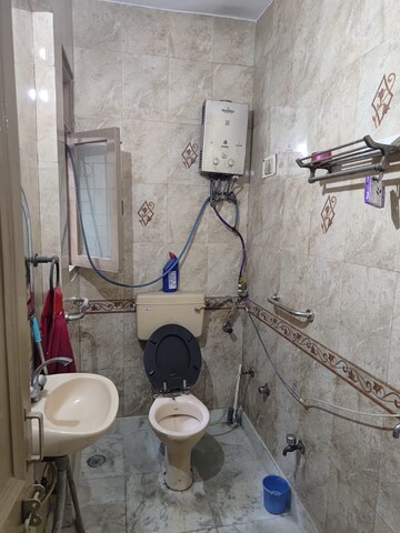 Bathroom in 2 BHK Apartment at Rohini Sector 13 – for Sale