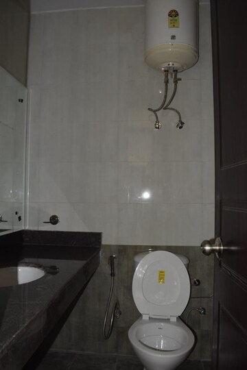 Bathroom in 4 BHK Builder Floor at Ansal API Esencia, Sector 67 – for Rent