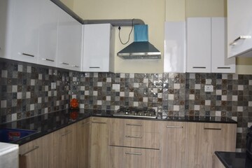 Kitchen in 4 BHK Builder Floor at Ansal API Esencia, Sector 67 – for Rent