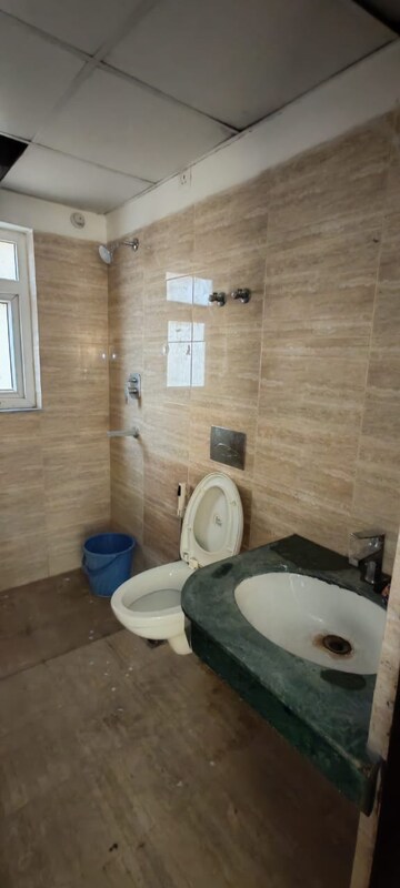 Bathroom in 3 BHK Apartment at BPTP Discovery Park, Sector 80 – for Rent