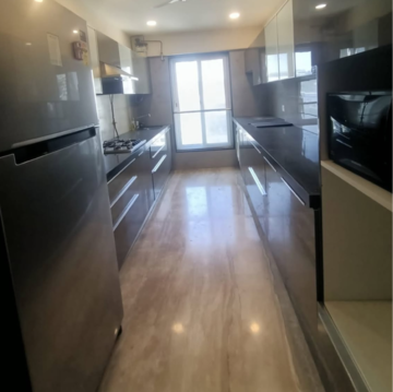 Kitchen in 2 BHK Apartment at Raheja Exotica, Pascal Wadi – for Rent