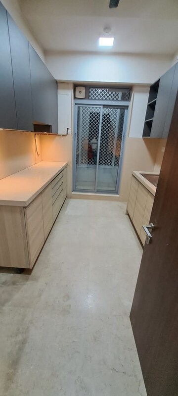 Kitchen in 2 BHK Apartment at Piramal Vaikunth, Balkum Pada – for Rent