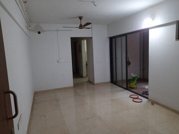 Living Room in 2 BHK Apartment at Lodha Palava Downtown Dombivli East, Dombivli East – for Rent