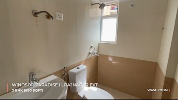 Bathroom in 2 BHK Apartment at Raj Nagar Extension – for Sale