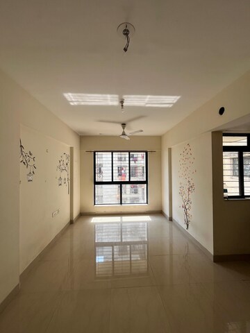 Living Room in 1 BHK Apartment at Lodha Crown Quality Homes Dombivli, Dombivli East – for Rent