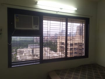 Room in 2 BHK Apartment at Samarth Ashish CHS, Andheri West – for Rent