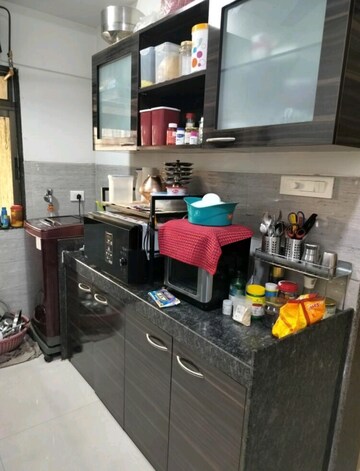 Kitchen in 3 BHK Apartment at Acme Ozone, Manpada – for Rent