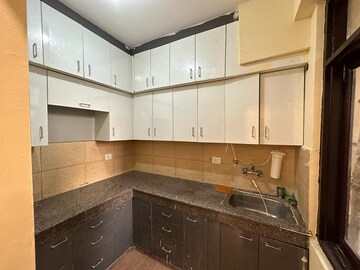 Kitchen in 2 BHK Apartment at Sangwan Heights, Raj Nagar Extension – for Rent