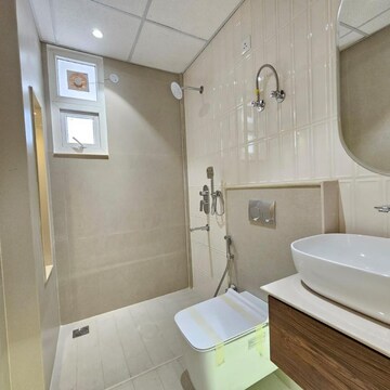 Bathroom in 3 BHK Apartment at Dhakoli Village – for Sale