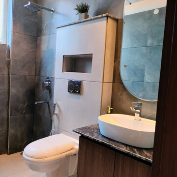 Bathroom in 3 BHK Apartment at Dhakoli Village – for Sale