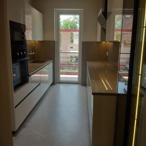 Kitchen in 3 BHK Apartment at Dhakoli Village – for Sale