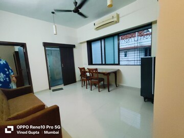 Living Room in 2 BHK Apartment at MIG Colony, Worli – for Rent