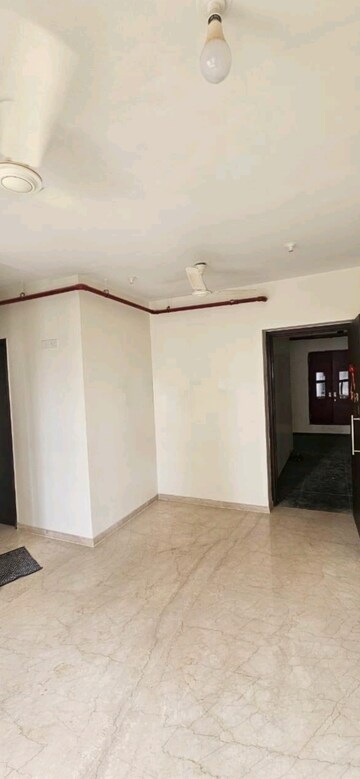 Living Room in 2 BHK Apartment at Kalpataru Paramount, Kapur Bawdi – for Rent