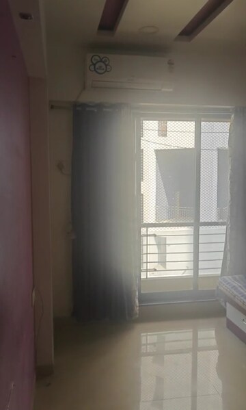 Master Bedroom in 2 BHK Apartment at Lalani Residency, Kavesar – for Rent