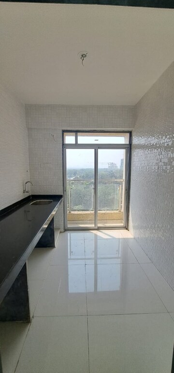 Kitchen in 1 BHK Apartment at Vipul Mahavir Sapphire, Ghansoli – for Sale