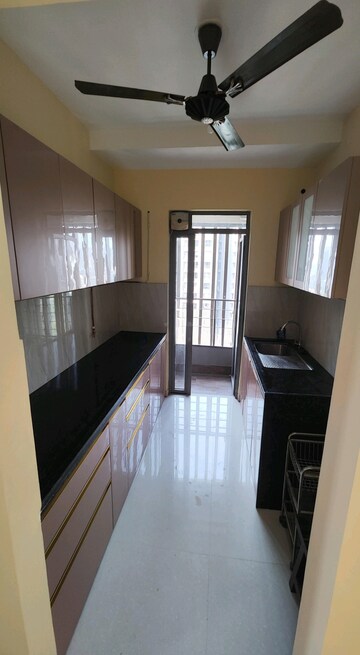Kitchen in 2 BHK Apartment at Kalpataru Paramount, Kapur Bawdi – for Rent