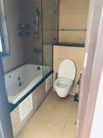Bathroom in 3 BHK Apartment at Tata Raheja Raisina Residency, Sector 59 – for Rent