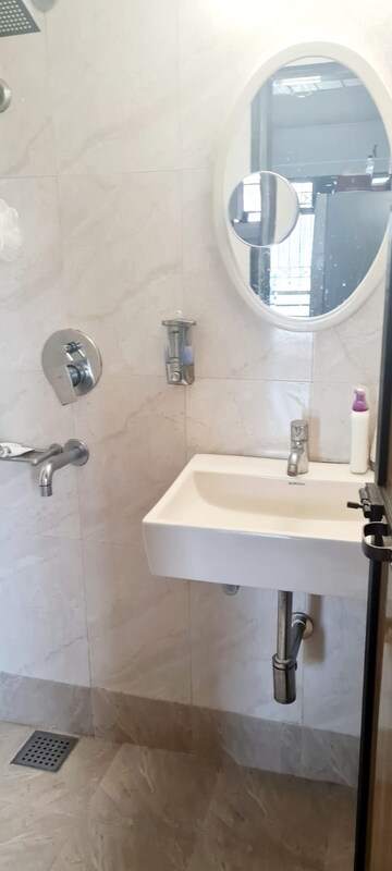 Bathroom in 2 BHK Apartment at Romell Diva, Malad West – for Rent