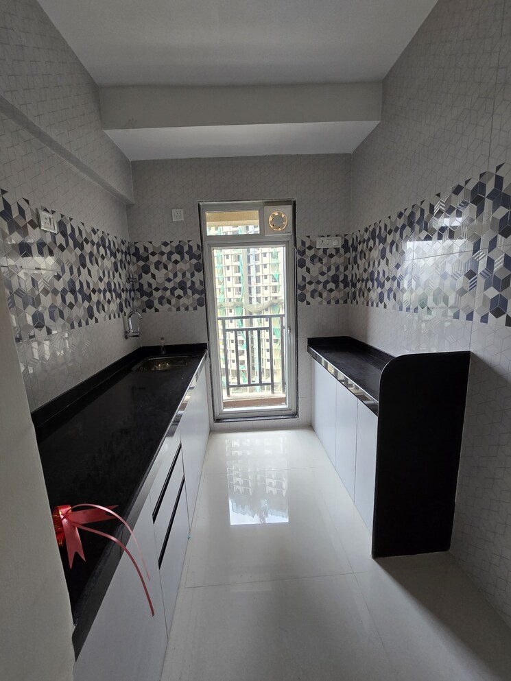 Kitchen, db-parkwoods 2 Bedroom 750 Sq.Ft. Apartment In Ghodbunder Road Thane 8452406