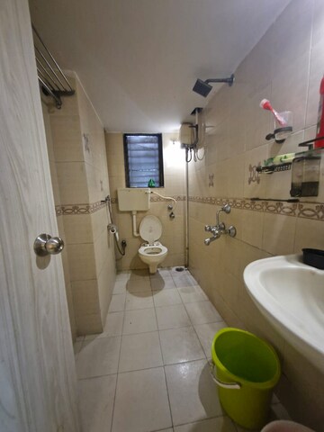 Bathroom in 2 BHK Apartment at Sukhmani, Andheri West – for Rent