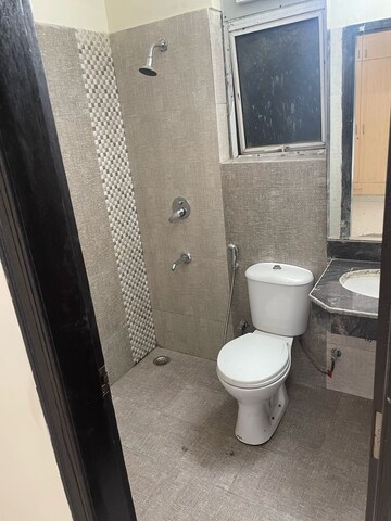 Bathroom in 3 BHK Builder Floor at Ansal API Esencia Wood Winds, Sector 67 – for Rent