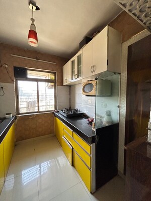 Kitchen in 2 BHK Apartment at Sagar Residency Thane, Kasarvadavali – for Sale