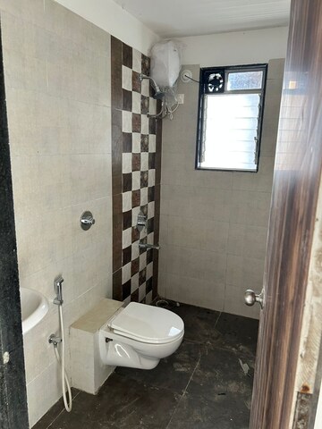 Bathroom in 3 BHK Apartment at Galaxy Green Woods, Kharghar – for Sale