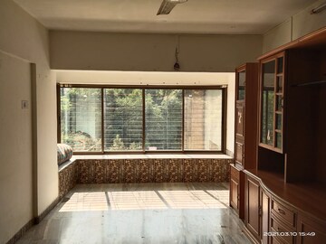 Living Room in 2 BHK Apartment at Sanjeev Enclave, Andheri West – for Sale
