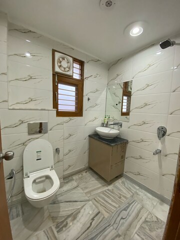 Bathroom in 1.5 BHK Builder Floor at Ansal Plaza Sector-23, Sector 23 – for Rent
