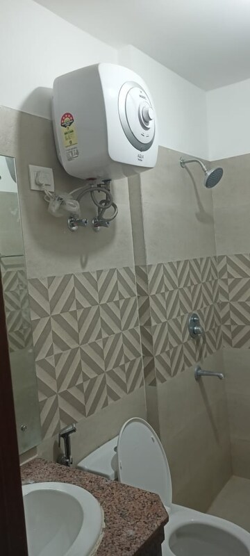 Bathroom in 3 BHK Apartment at Sam Palm Olympia, Sector 16c Greater Noida – for Rent