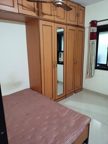 Master Bedroom in 1.5 BHK Apartment at Lokpuram CHS, Vasant Vihar – for Rent