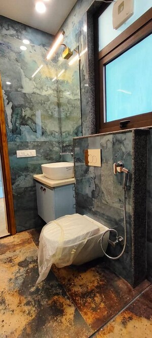 Bathroom in 3 BHK Builder Floor at Mukherjee Nagar – for Sale