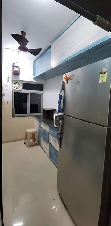 Kitchen in 2 BHK Apartment at Kalpataru Hills Phase II, Manpada – for Rent