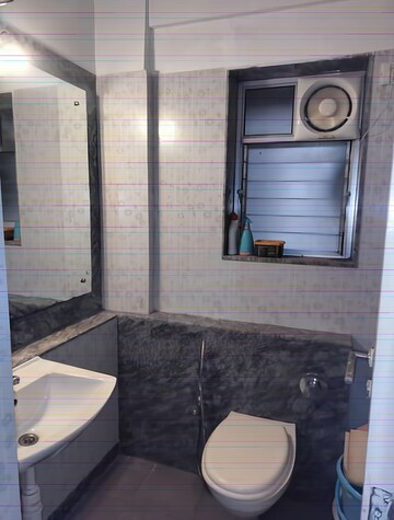 Bathroom in 2 BHK Apartment at Kalpataru Hills Phase II, Manpada – for Rent
