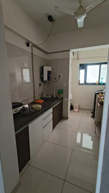 Kitchen in 2 BHK Apartment at Duville Riverdale Heights, Kharadi – for Rent