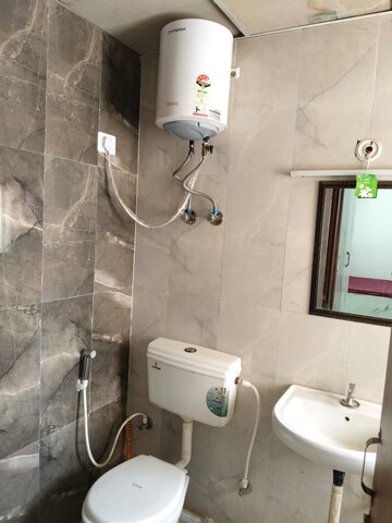 Bathroom in 2 BHK Apartment at Signature Global Proxima, Sector 89 – for Rent